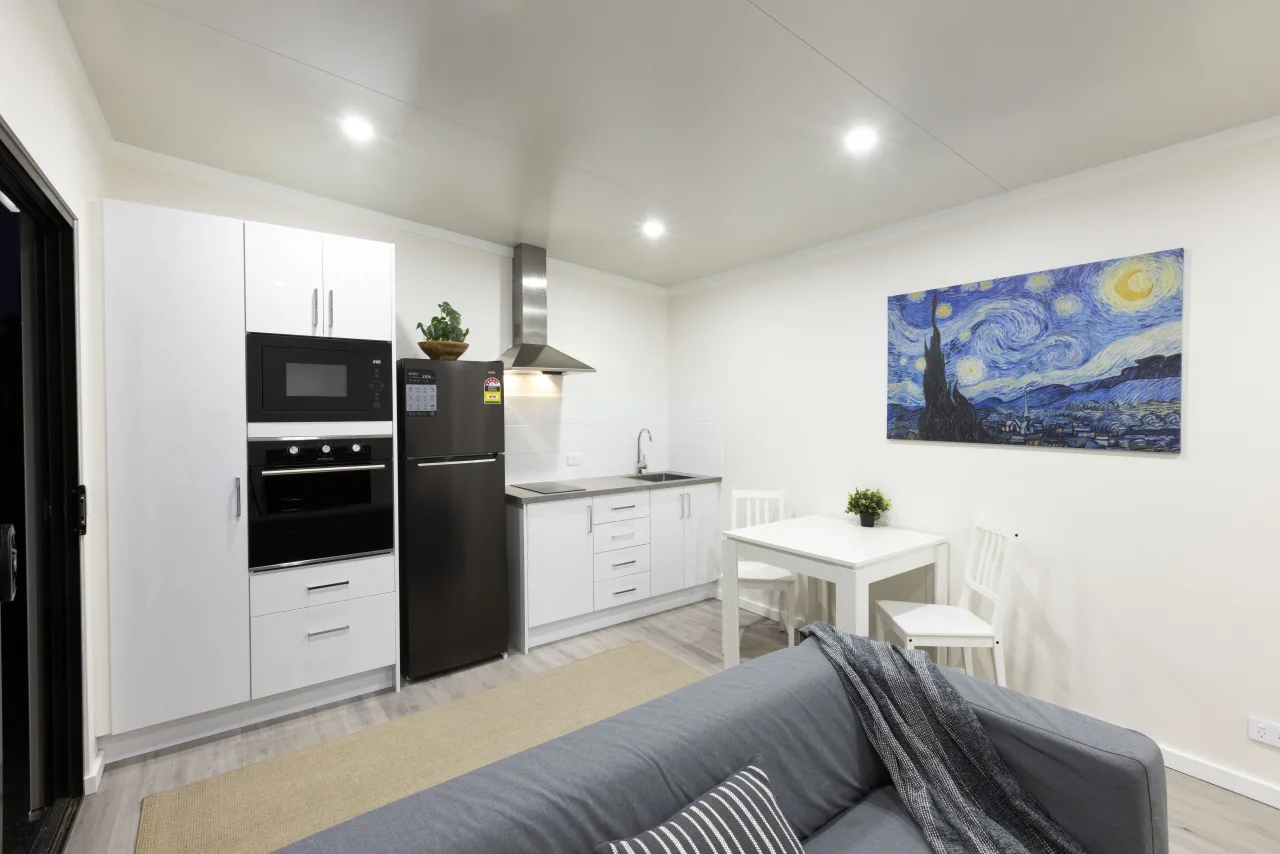 Living area & one-sided galley Kitchen