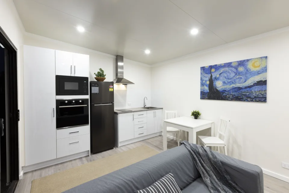  Living area & one-sided galley Kitchen 