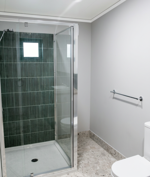 Green Feature Tile in Shower Cubicle